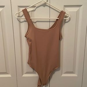 Xs tan Abercrombie body suit never worn